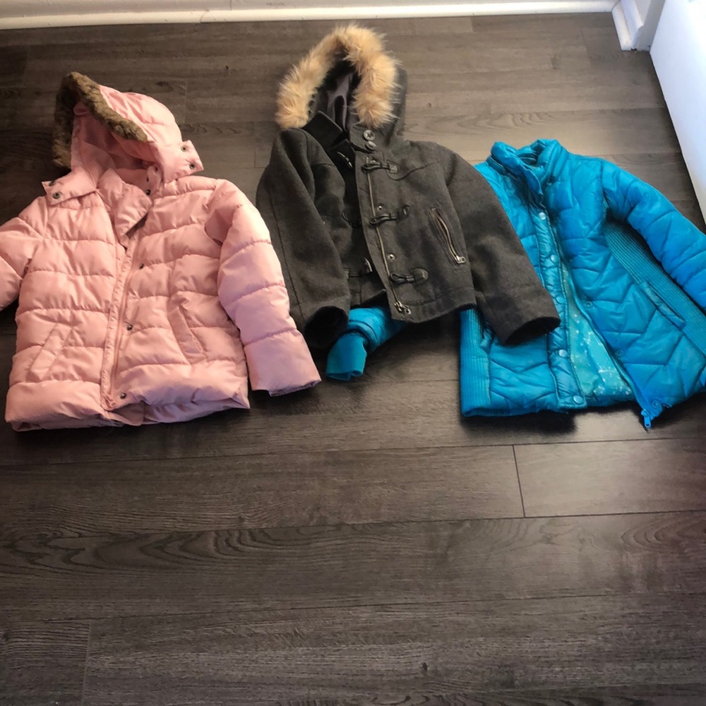 Three girls coats